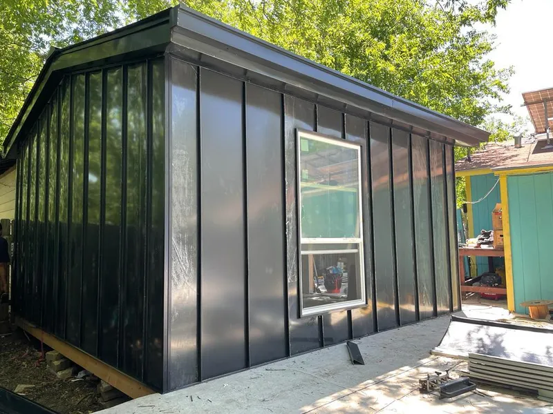 Black standing seam metal wall panels for Metal Roof Installation in Hamtramck