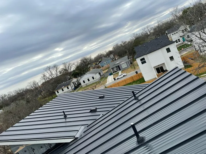 Standing seam metal roof panels with vents for Skylight Repair in Hamtramck